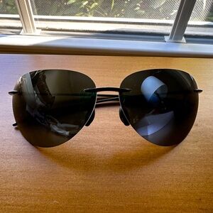 Brand new Maui Jim MJ Sport Plano Sunglasses.
Hard case, booklet, drawstring bag